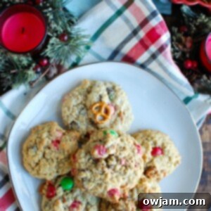 Peanut Butter Pretzel Chocolate Chip Cookies featuring creamy peanut butter, oats, crunchy pretzels, M&Ms, and chocolate chips.