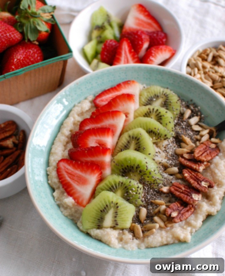 Fresh Strawberry Kiwi Chia Oat Breakfast 3 Close-up of a Strawberry Kiwi Chia Seed Oat Bran Bowl, showcasing the creamy oat bran base, fresh fruit, and sprinkled seeds, highlighting its delicious and healthy appeal.