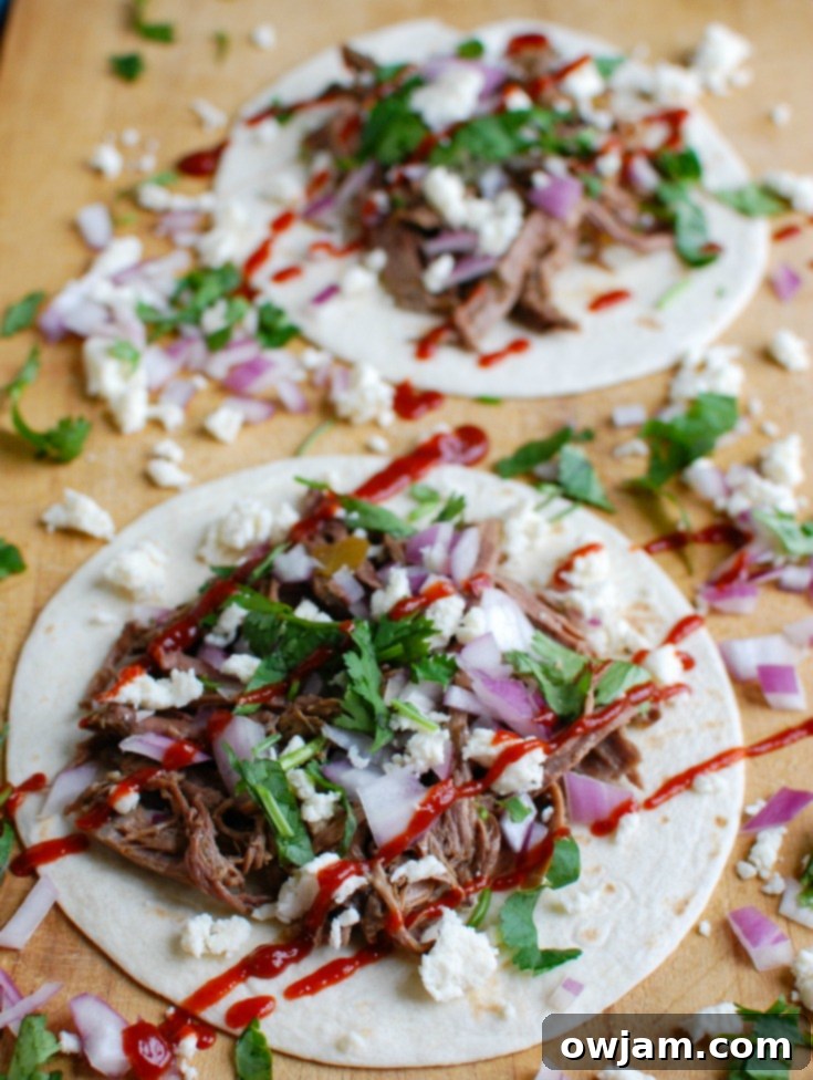 Juicy, tender, and flavor-packed Slow Cooker Beef Barbacoa served in a bowl, ready for tacos or rice.