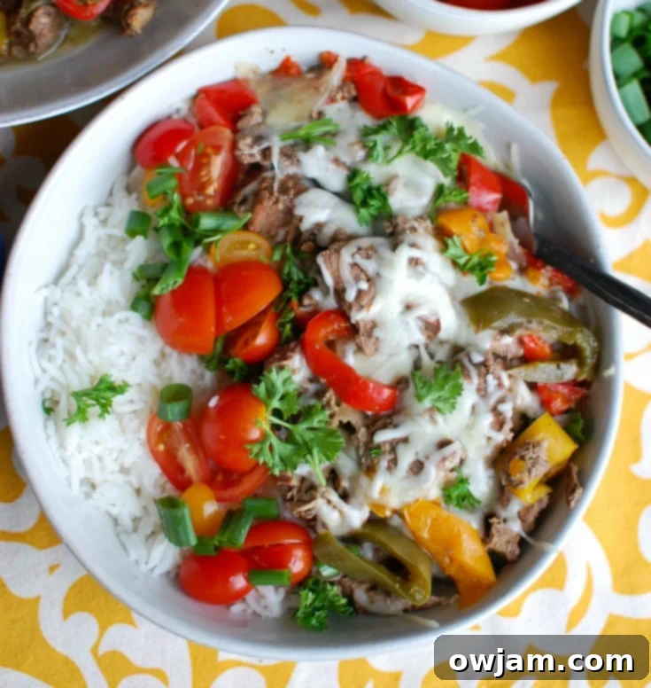 Set-and-Forget Philly Cheesesteak Rice Bowls 5 Assembled Slow Cooker Philly Cheesesteak Rice Bowl with vibrant toppings