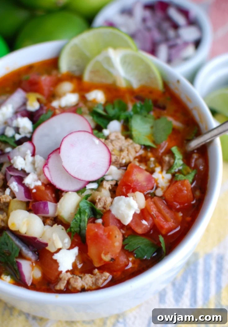 Tender Slow Cooker Pork Pozole 3 Slow Cooker Pork Pozole with fresh radishes, cilantro and lime.
