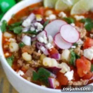Tender Slow Cooker Pork Pozole 6 Slow Cooker Pork Pozole in a white bowl