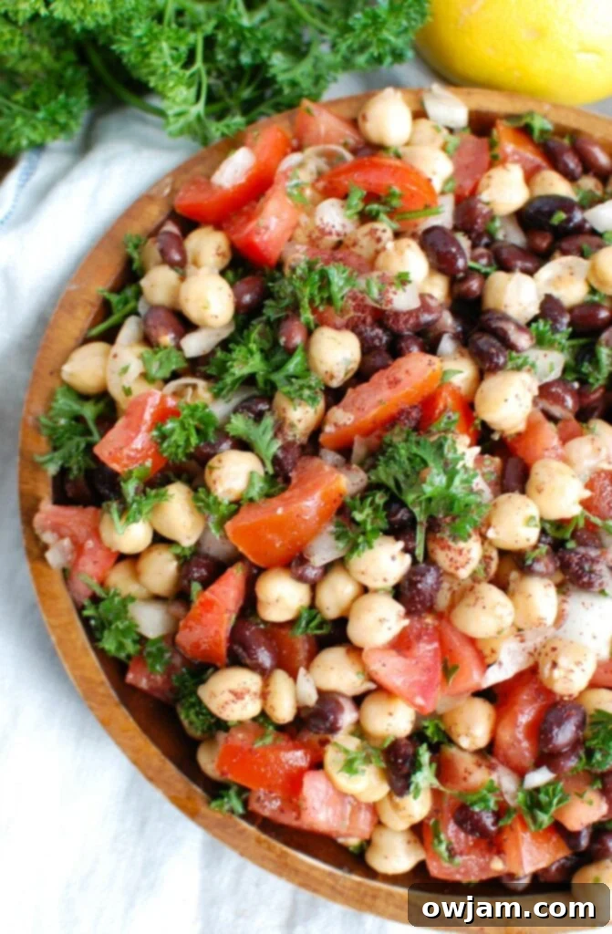 Mediterranean Chickpea and Bean Salad 2 Balela Salad is a light and healthy salad mixing chickpeas, black beans, tomatoes, onion and parsley topped with a lemony sumac dressing with a hint of spice. This works great as lunch, as a side to dinner or topping to your pita, rice bowls or alongside grilled chicken or seafood.