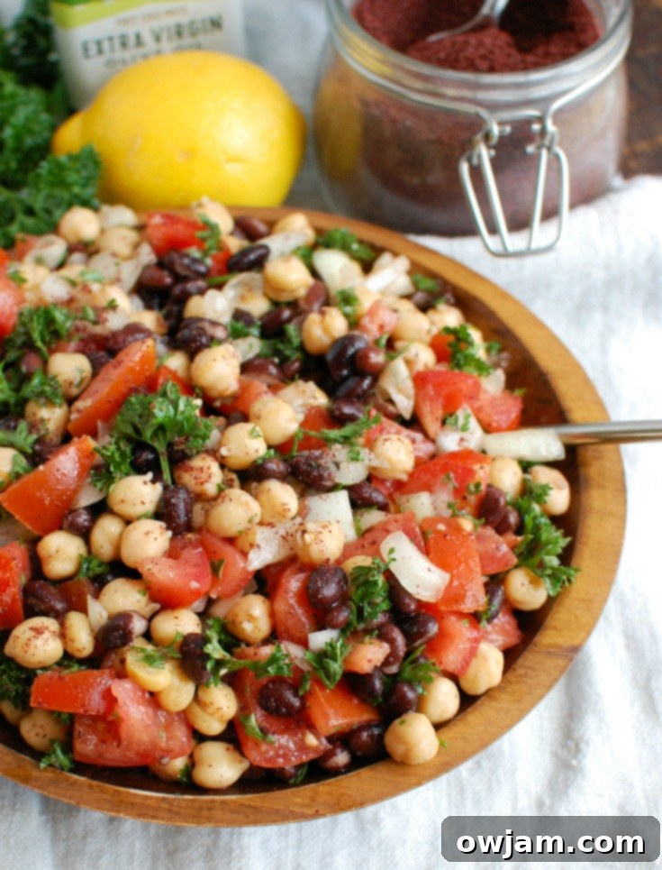 Mediterranean Chickpea and Bean Salad 3 Balela Salad is a light and healthy salad mixing chickpeas, black beans, tomatoes, onion and parsley topped with a lemony sumac dressing with a hint of spice. This works great as lunch, as a side to dinner or topping to your pita, rice bowls or alongside grilled chicken or seafood.