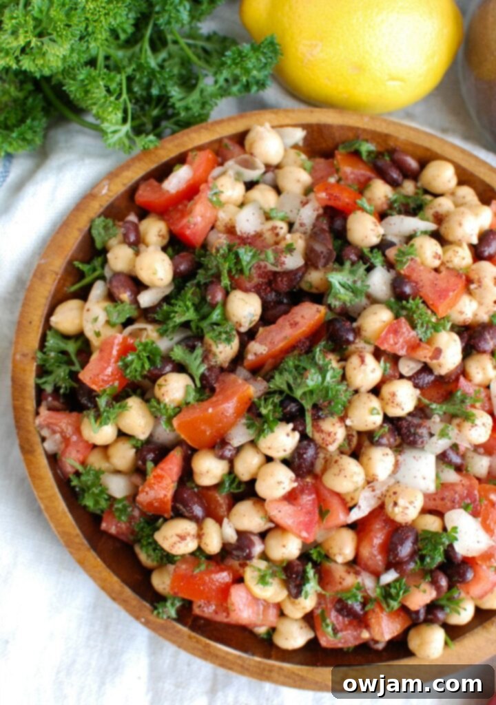 Mediterranean Chickpea and Bean Salad 4 Balela Salad is a light and healthy salad mixing chickpeas, black beans, tomatoes, onion and parsley topped with a lemony sumac dressing with a hint of spice. This works great as lunch, as a side to dinner or topping to your pita, rice bowls or alongside grilled chicken or seafood.