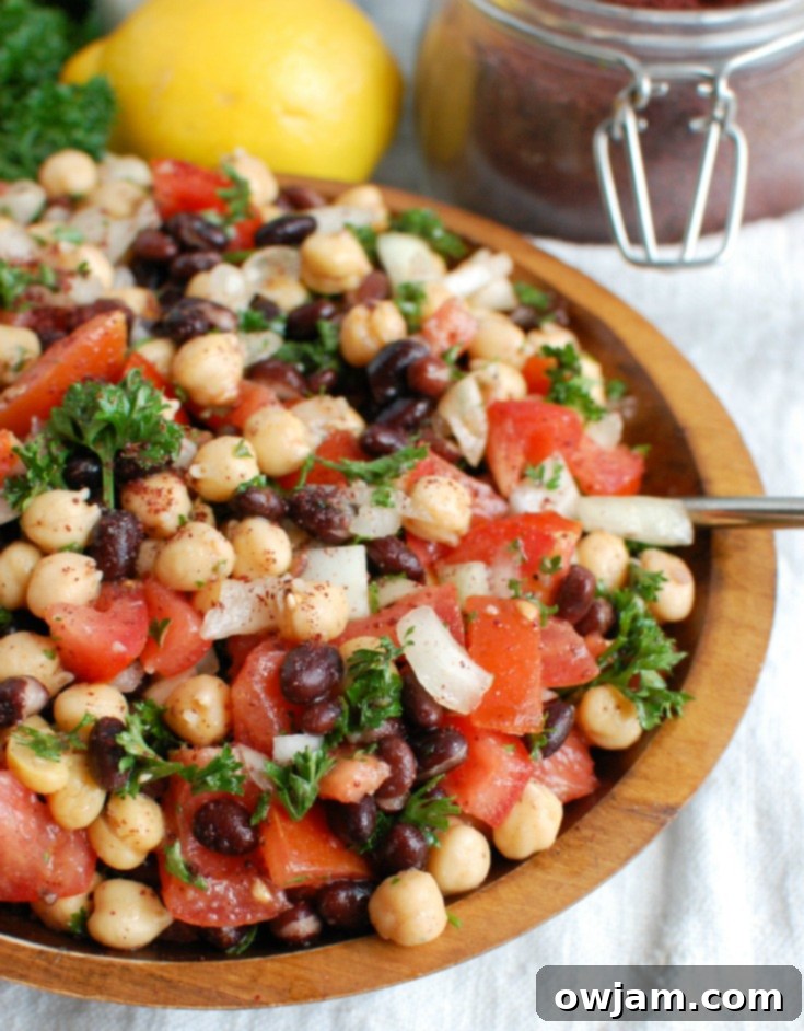 Mediterranean Chickpea and Bean Salad 5 Balela Salad is a light and healthy salad mixing chickpeas, black beans, tomatoes, onion and parsley topped with a lemony sumac dressing with a hint of spice. This works great as lunch, as a side to dinner or topping to your pita, rice bowls or alongside grilled chicken or seafood.