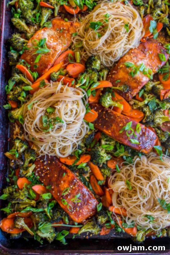 19 Fresh & Healthy Seafood Delights 21 A convenient sheet pan meal featuring savory Asian-glazed salmon, tender broccoli, crisp carrots, and delicate rice noodles, cooked together for easy cleanup and maximum flavor.