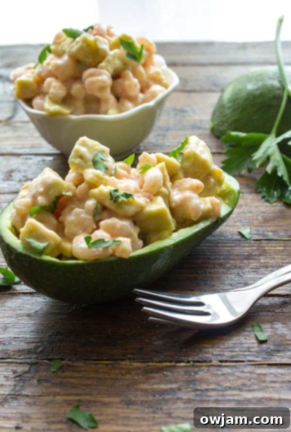 19 Fresh & Healthy Seafood Delights 7 Fresh avocados halved and generously stuffed with a creamy, flavorful shrimp salad, creating a light, healthy, and satisfying meal or appetizer.