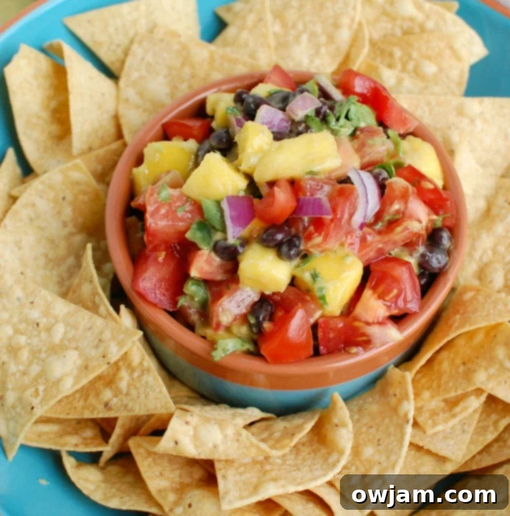 Sweet and Savory Mango Black Bean Salsa 2 Close up of vibrant Mango and Black Bean Salsa in a bowl