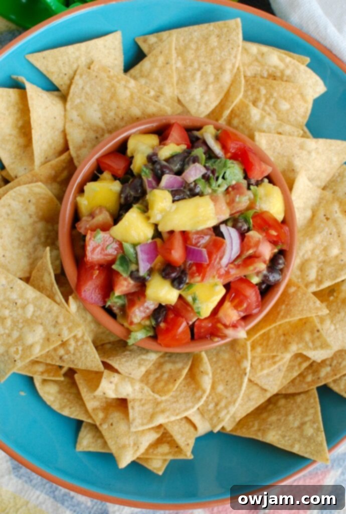 Sweet and Savory Mango Black Bean Salsa 3 Mango and Black Bean Salsa from above in a colorful bowl