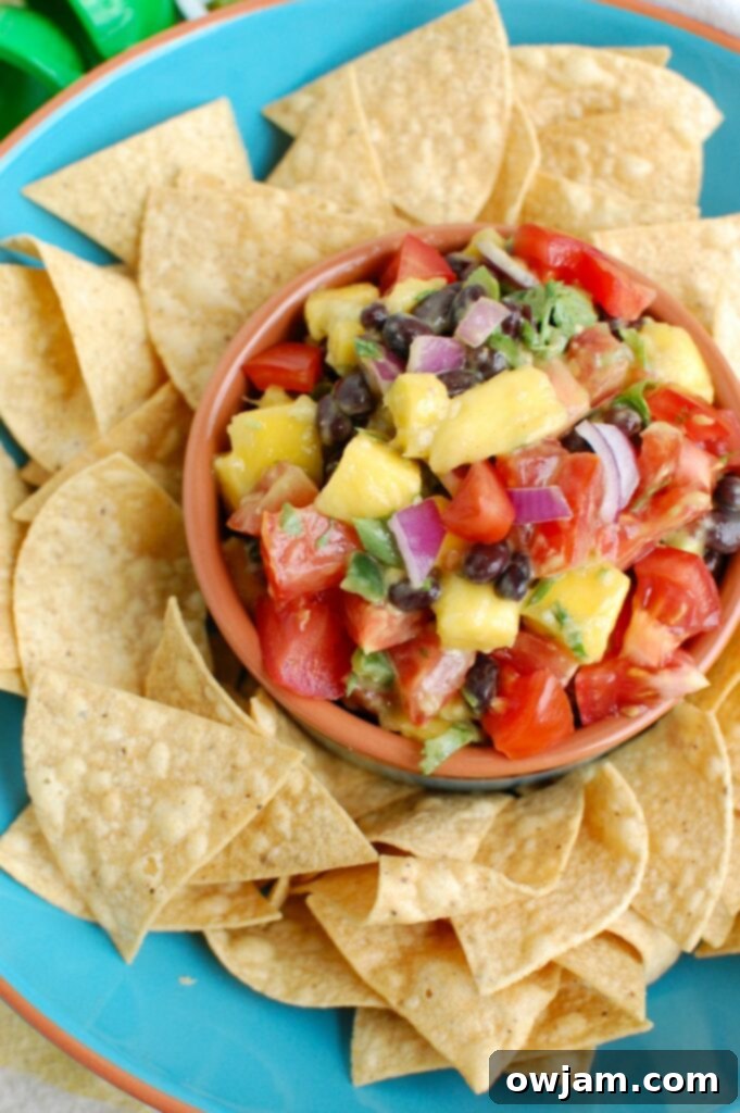 Sweet and Savory Mango Black Bean Salsa 4 Mango and Black Bean Salsa served in a blue bowl