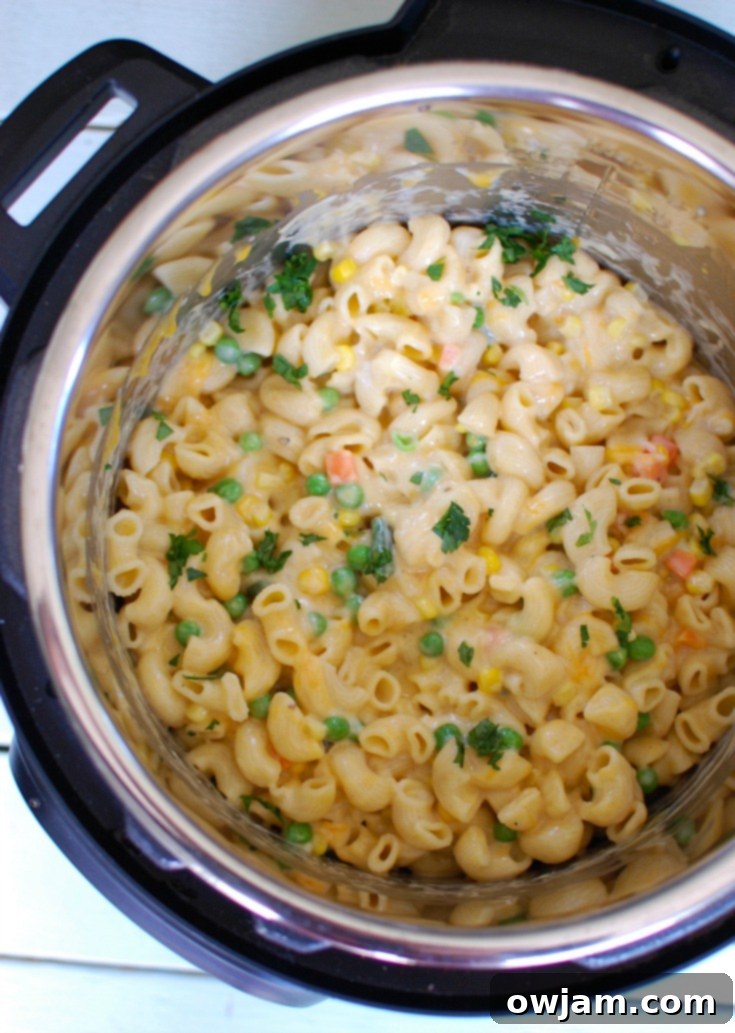 One Pot Veggie Mac Magic 4 Instant Pot Vegetable Mac and Cheese in the pot.