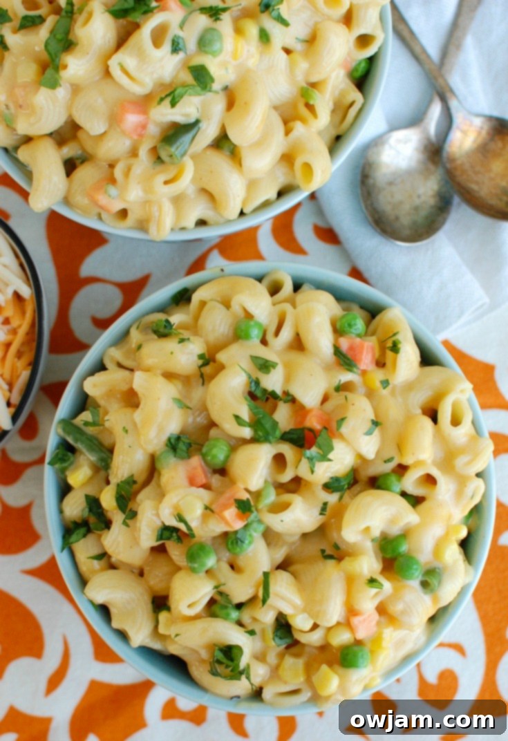 One Pot Veggie Mac Magic 5 Instant Pot Vegetable Mac and Cheese in blue bowl