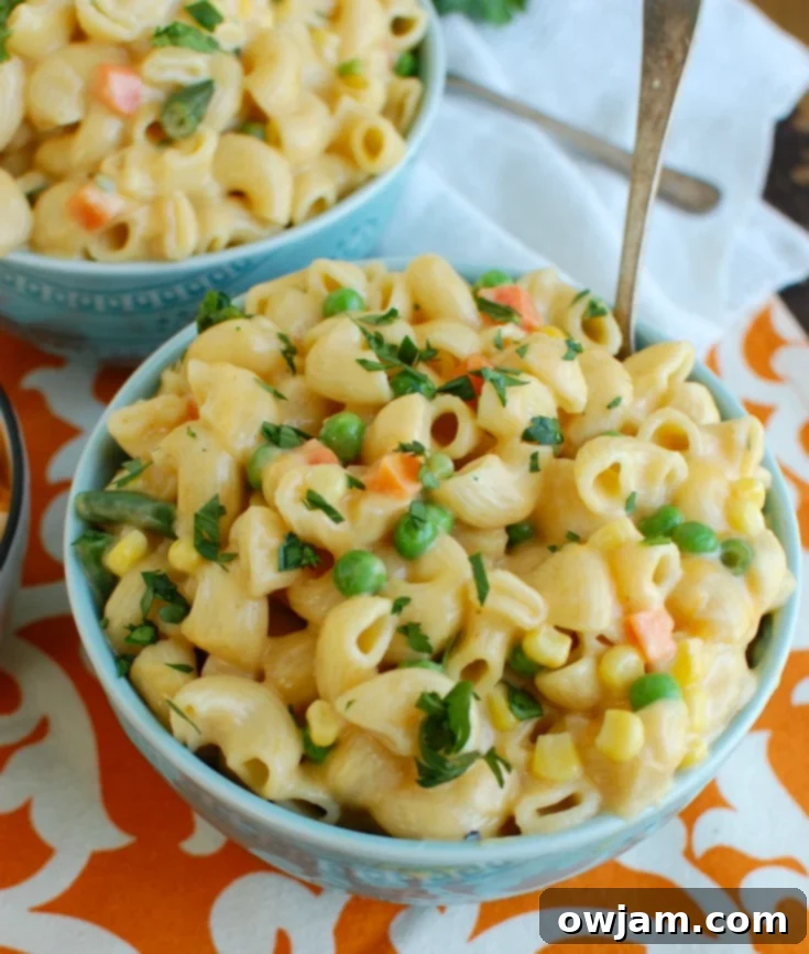 One Pot Veggie Mac Magic 6 Instant Pot Vegetable Mac and Cheese in blue bowl