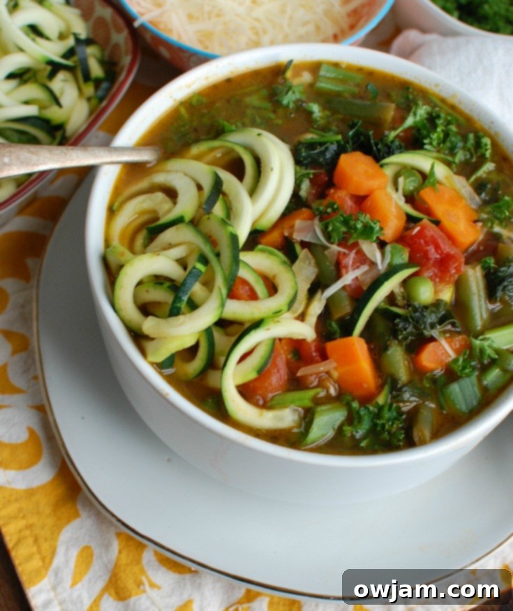 Vibrant Spring Minestrone 6 A beautifully presented bowl of Spring Vegetable Minestrone, invitingly ready to be enjoyed, highlighting its fresh ingredients and comforting nature.