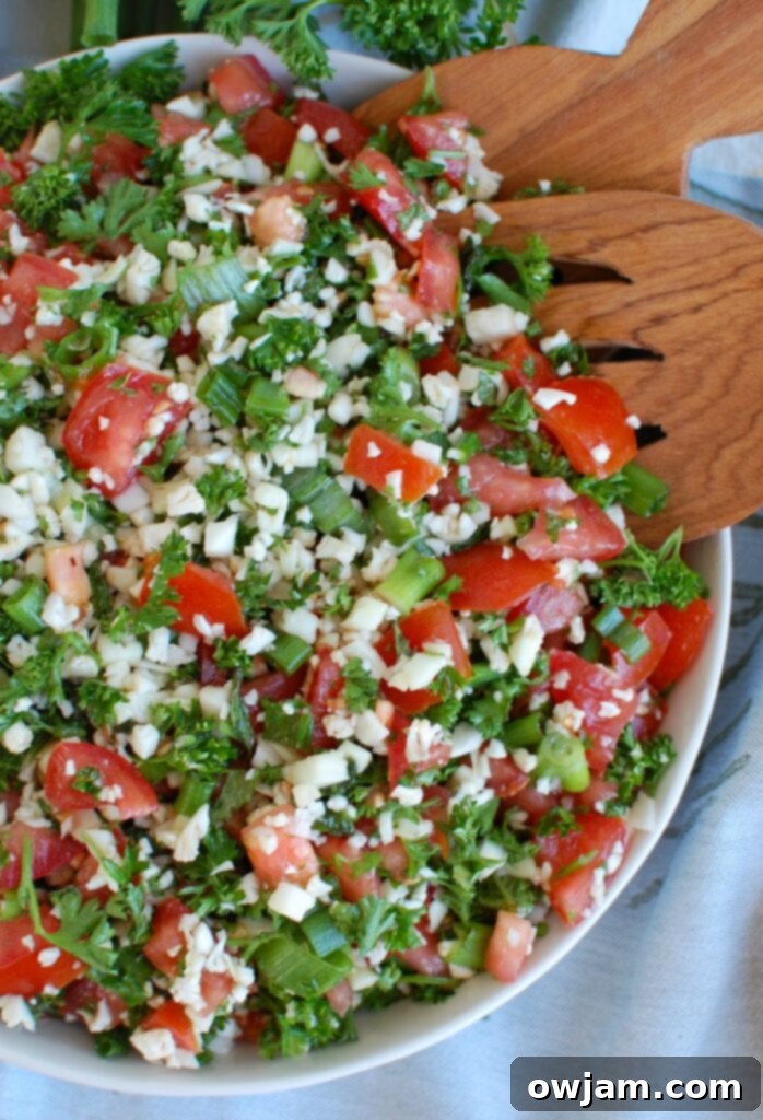 Close-up of Cauliflower Tabbouleh showing the vibrant ingredients and fresh dressing