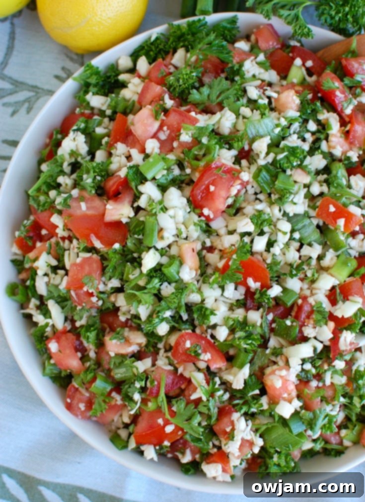 Large bowl of fresh Cauliflower Tabbouleh, garnished and ready to serve