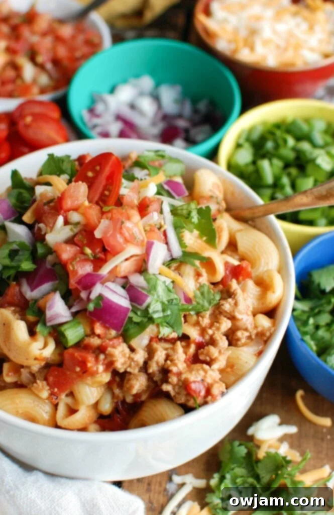 13 Instant Pot Recipes You'll Crave 3 A bowl of Instant Pot Turkey Taco Pasta, a zesty and family-friendly meal with seasoned ground turkey, fire-roasted tomatoes, and perfectly cooked pasta.