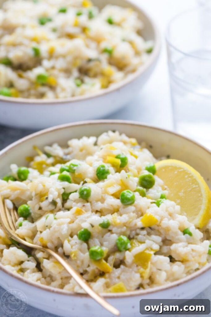 13 Instant Pot Recipes You'll Crave 7 Creamy Pressure Cooker Risotto with Leeks, Peas, and Lemon, a vibrant and naturally gluten-free vegetarian dish, garnished with fresh herbs.