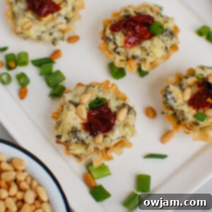 Platter of golden spinach artichoke sun-dried tomato phyllo bites