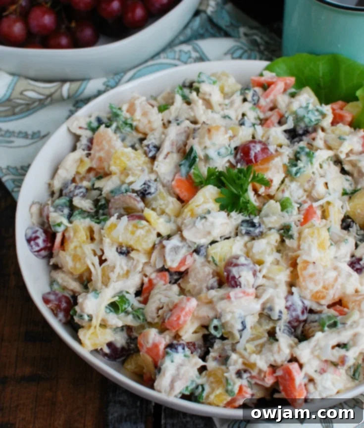 Island Chicken Salad 2 Tropical Chicken Salad in a white bowl, showcasing colorful ingredients