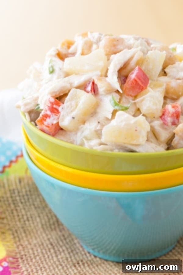 11 Effortless Chicken Salad Recipes 12 Exotic Tropical Chicken Salad, combining shredded chicken with tropical fruits like mango or pineapple and a light dressing, creating a sweet and savory sensation.