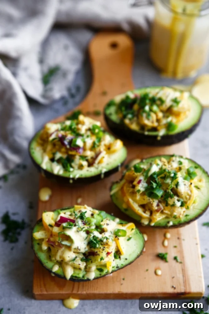 11 Effortless Chicken Salad Recipes 5 Healthy Paleo Whole30 Chicken Salad Boats, featuring a clean and compliant chicken salad served in lettuce cups or other vegetable 'boats' for a low-carb, grain-free option.