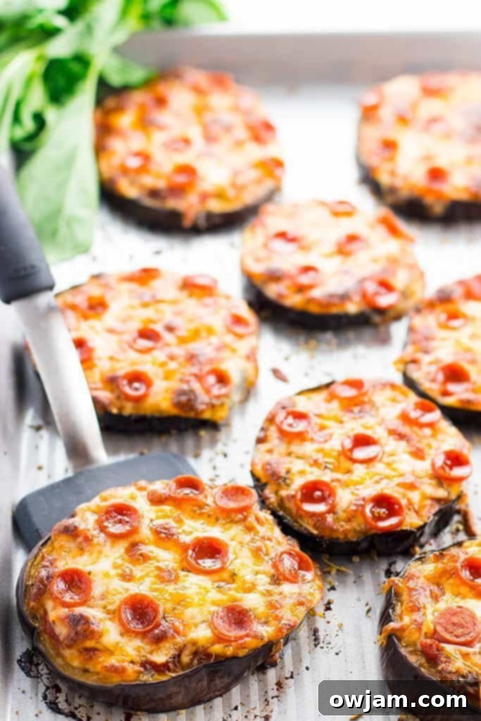 11 Incredible Eggplant Dishes 8 Mini Eggplant Pizzas topped with cheese and basil