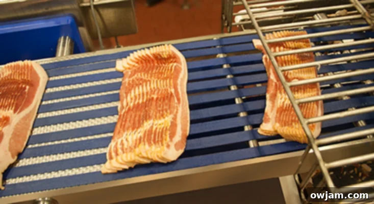 Freshly sliced bacon ready for packaging