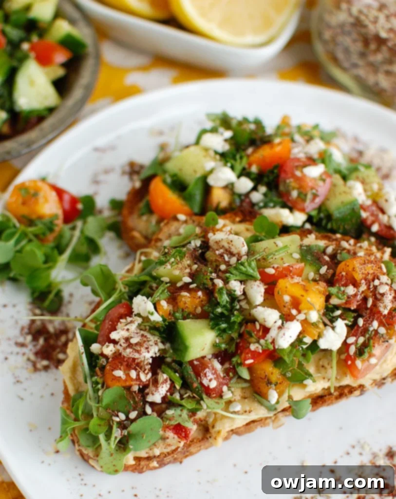 Zaatar Spiced Mediterranean Hummus Toast 4 Mediterranean Hummus Toast with Za'atar on White Plate