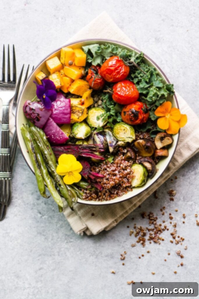 Roasted Veggie Winter Bowls - A beautifully arranged bowl of roasted winter vegetables, grains, and a flavorful dressing, perfect for a cozy meal.