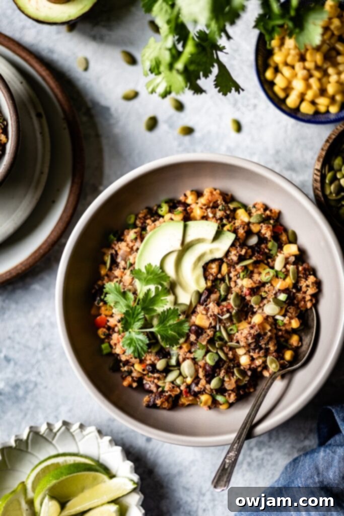 One Pan Mexican Quinoa - A colorful and hearty one-pan Mexican quinoa dish, loaded with beans, corn, and fresh herbs.