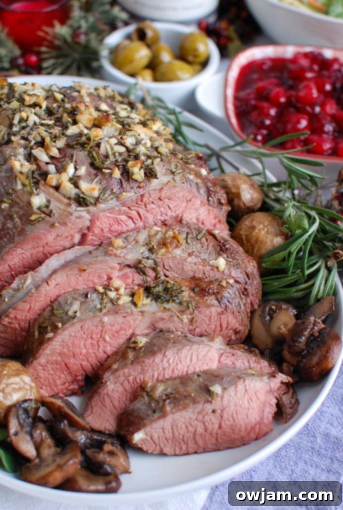 Melt in Your Mouth Roast Beef 2 Rosemary and Garlic Roast Beef with fresh rosemary sprigs