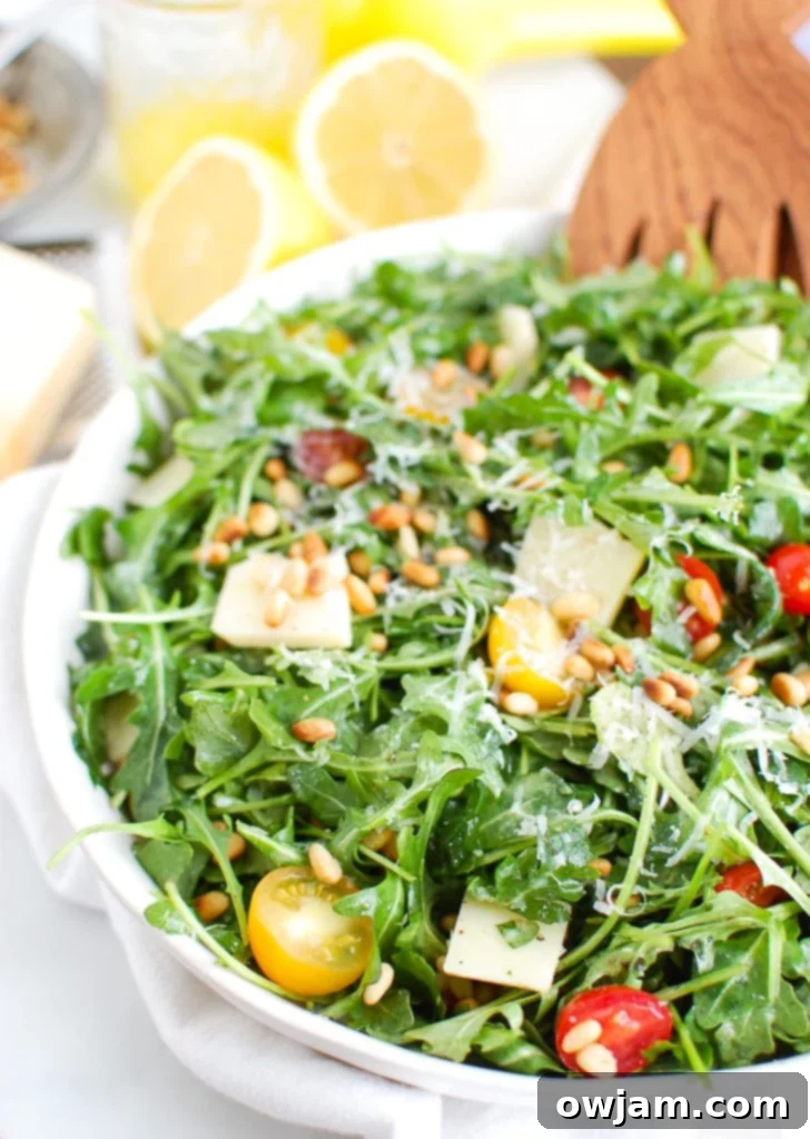 Bright Lemon Arugula Parmesan Salad 2 Lemon Arugula Salad with Pine Nuts White Bowl