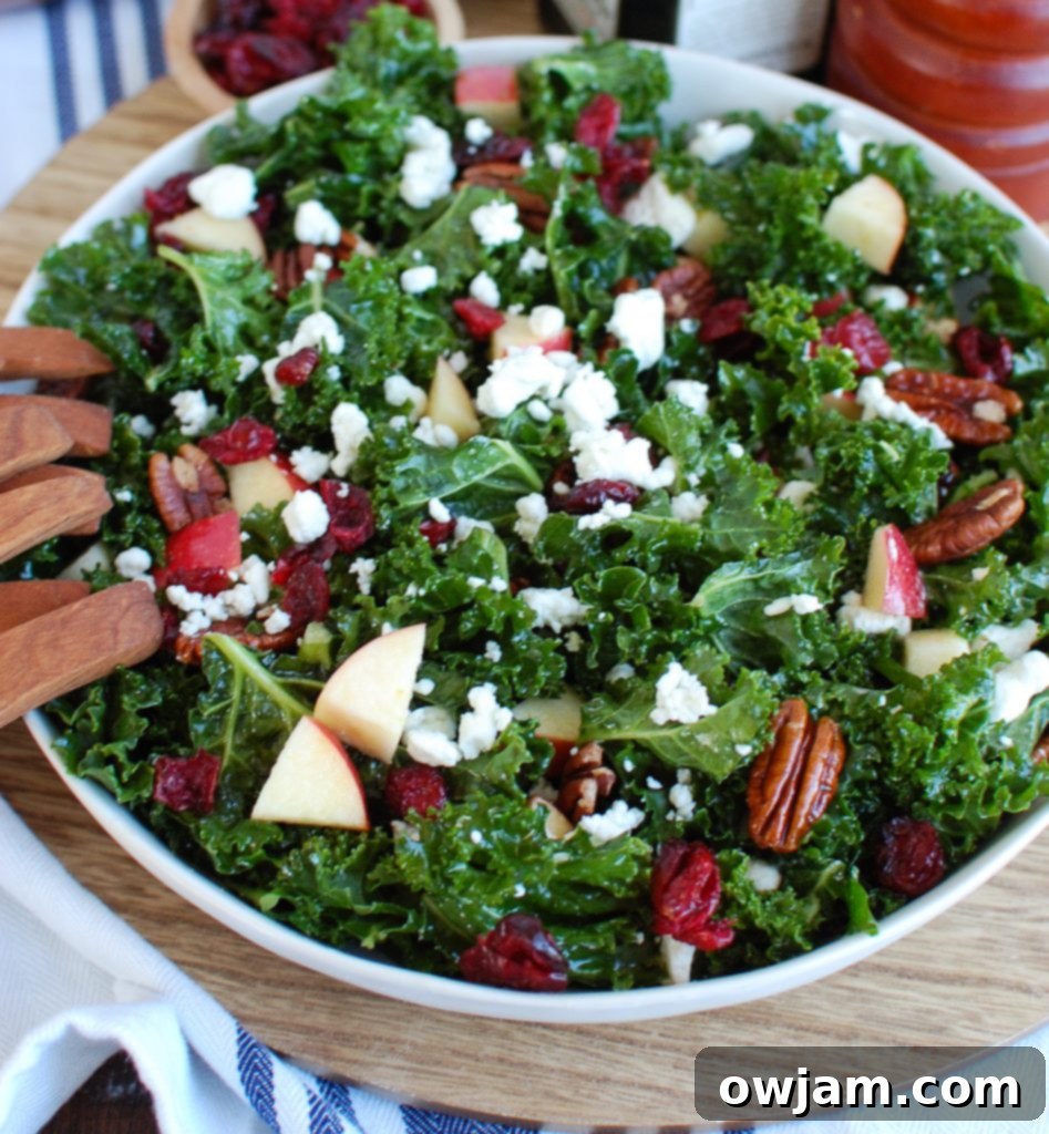 Vibrant Kale Cranberry Salad 5 Kale Salad with Cranberries on a Wood Plate