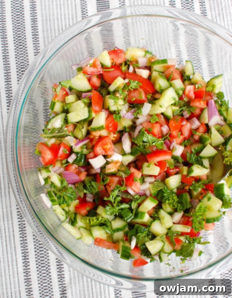 Israeli Salad Mixed Ingredients in Clear Bowl