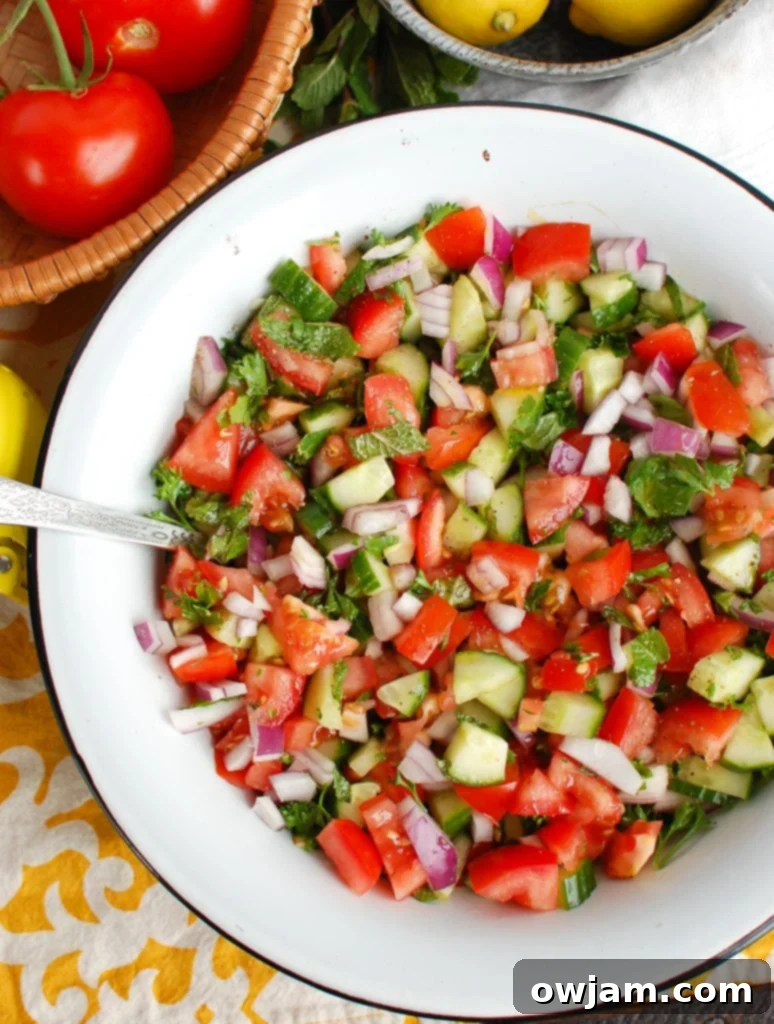 Israeli Salad with silver spoon 
