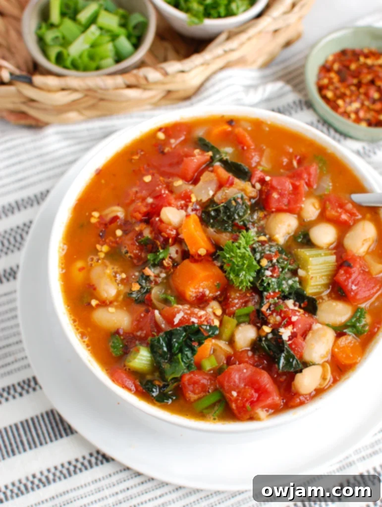 White Bean Soup with Kale in white bowl