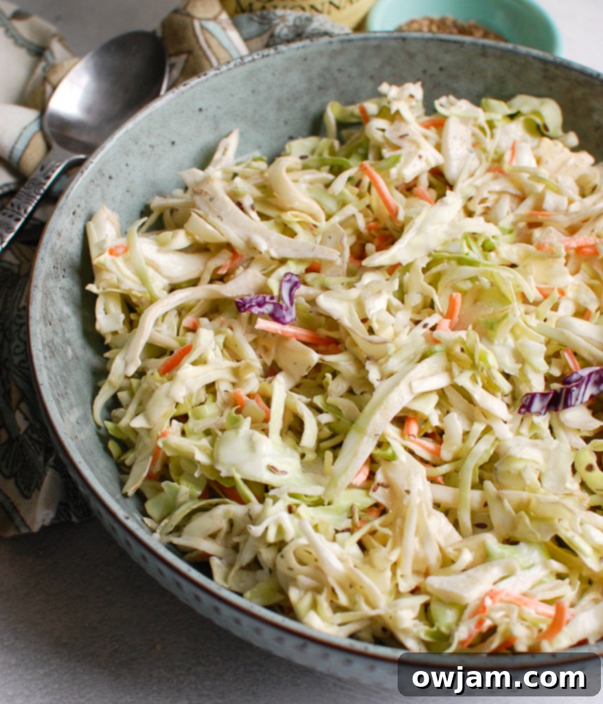 Creamy Coleslaw Recipe in blue bowl