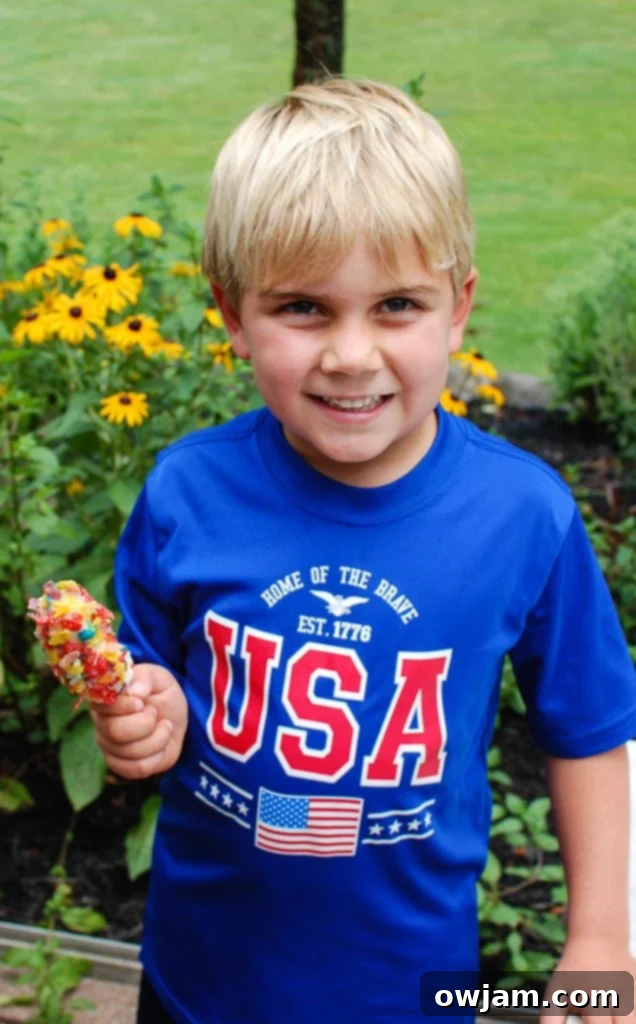 Golden Banana Crunch Pop 8 Banana Crunch Popsicle Drew eating outside