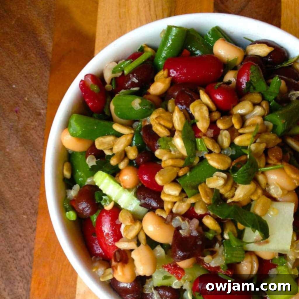 Colorful Four Bean Salad with Quinoa, Sun-Dried Tomatoes, and Sunflower Seeds