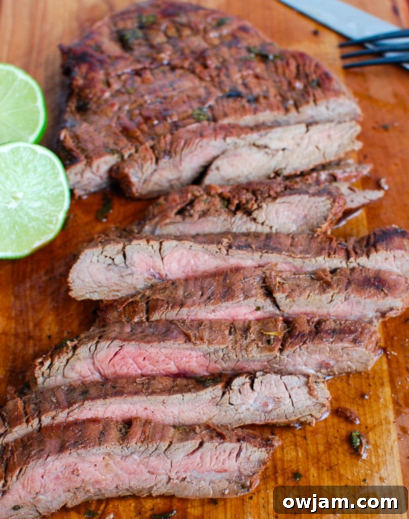 Ultimate Grilled Carne Asada 2 Grilled Carne Asada on cutting board with knife
