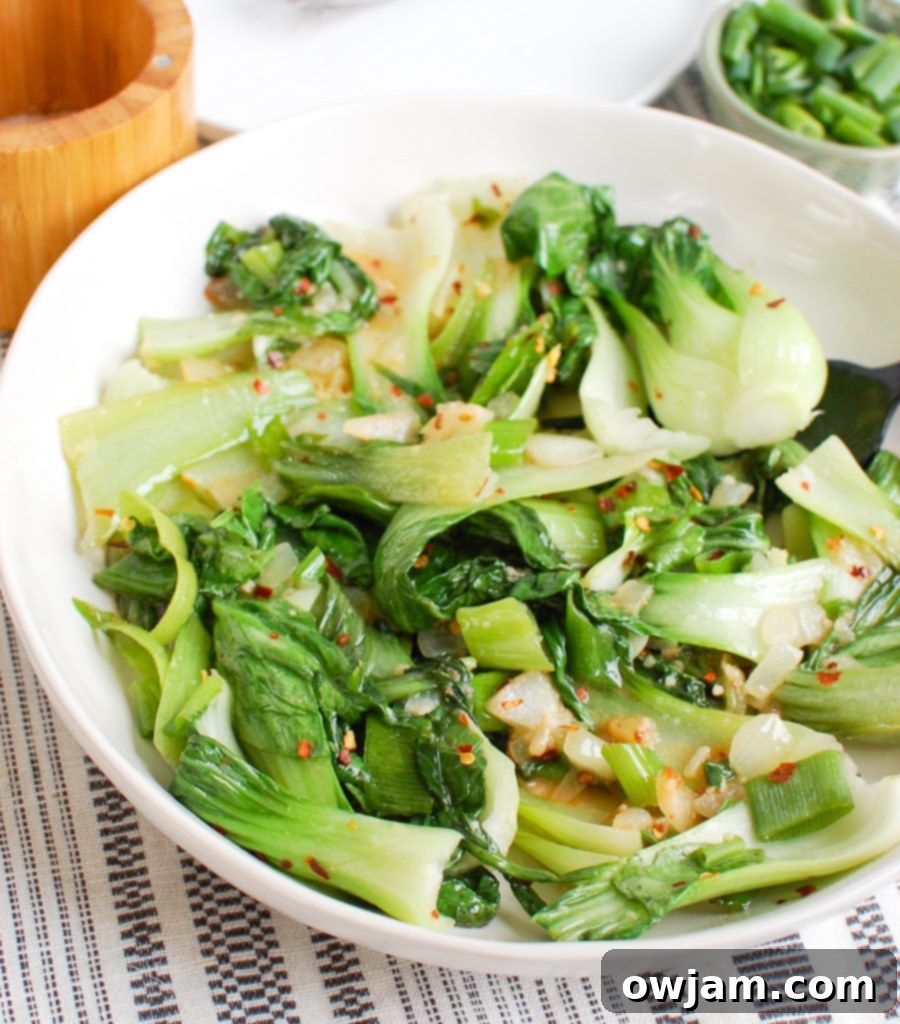 Effortless Bok Choy 6 Easy Bok Choy Recipe with a fork, ready to eat
