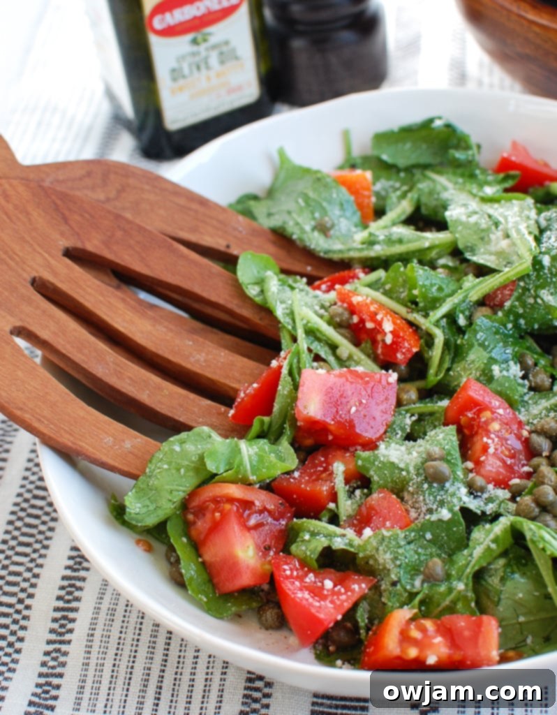 Arugula Salad with Capers in white bowl