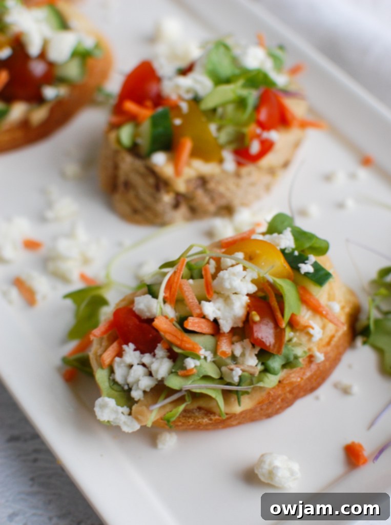 Sun-Kissed Crostini Bites 2 Mediterranean Crostini on plate