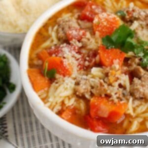 Italian Sausage Soup in a white bowl