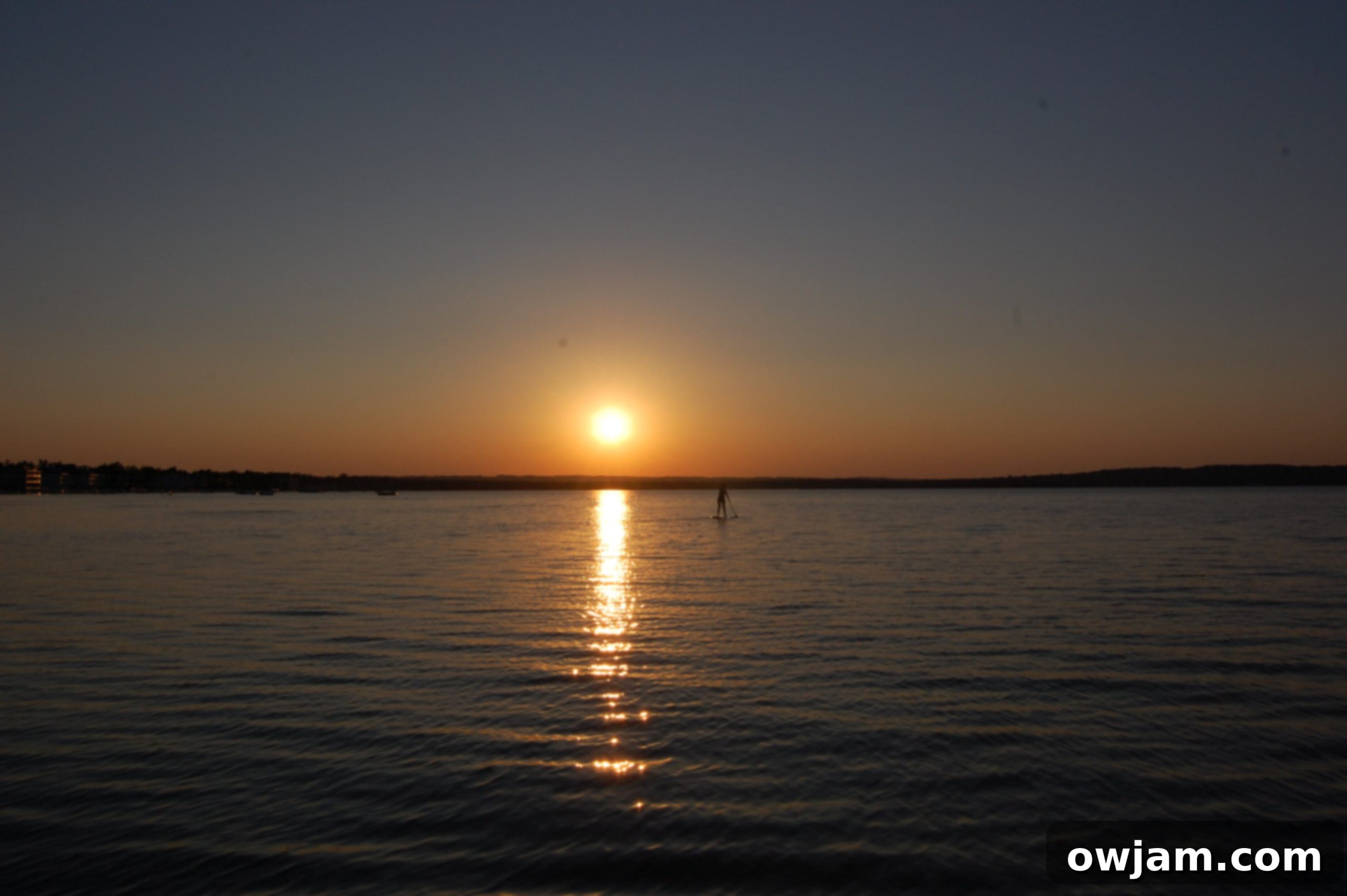 Beautiful sunset over Lake Michigan in Traverse City, Michigan, with reflections on the water