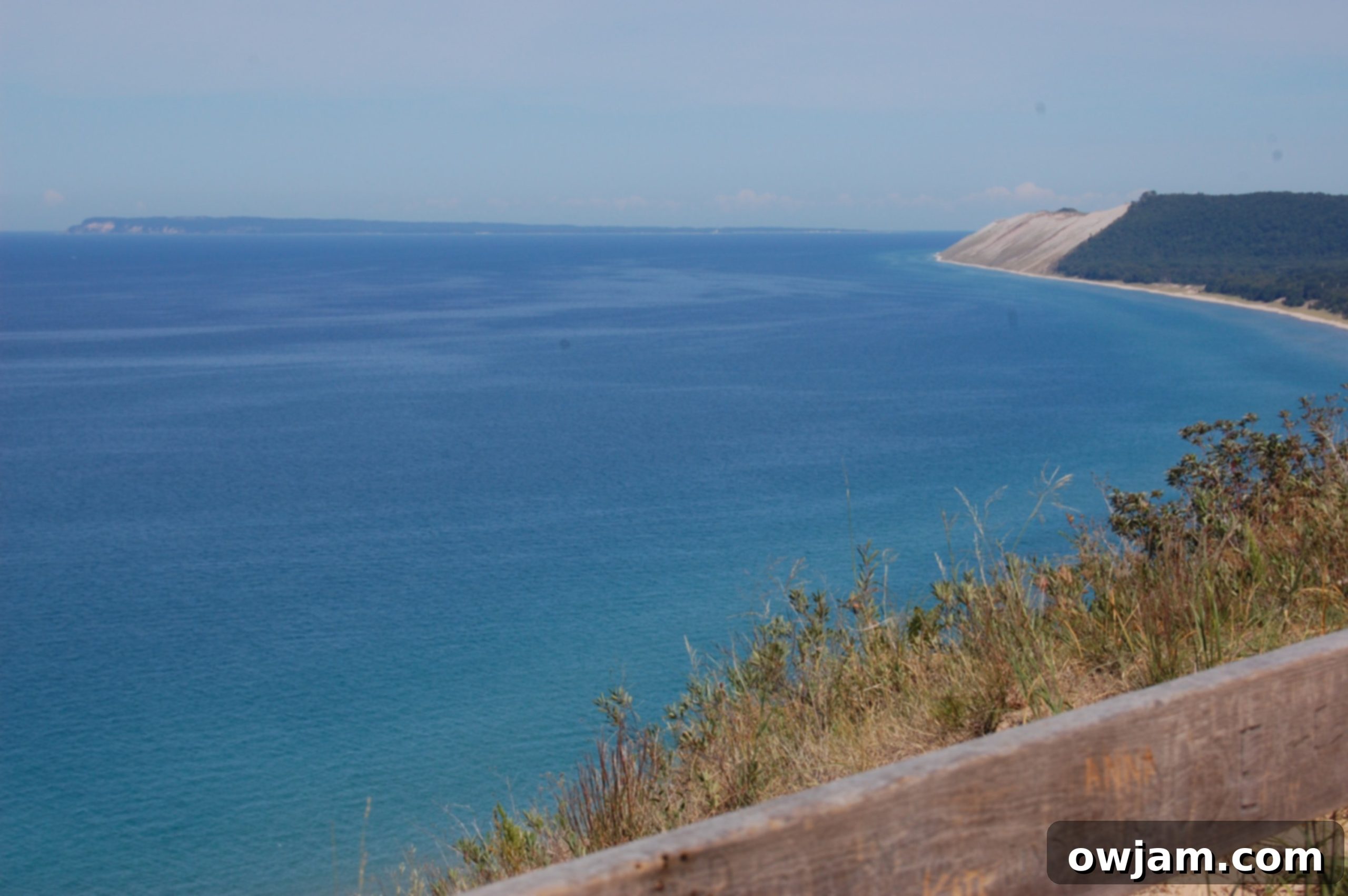 Scenic view of the vast sand dunes and blue water at Sleeping Bear Dunes National Lakeshore in Michigan