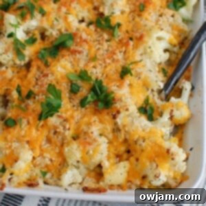 Cheesy Cauliflower Bake 7 Cauliflower Gratin with a golden-brown top in a white baking dish.