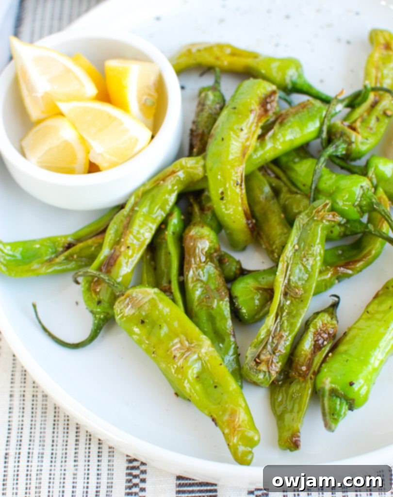 Unlock the Flavor of Shishito Peppers 5 How to Cook Shishito Peppers with lemon wedges and a side of dipping sauce